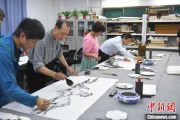 解梦软件两岸艺术家在安徽“共绘一幅画”